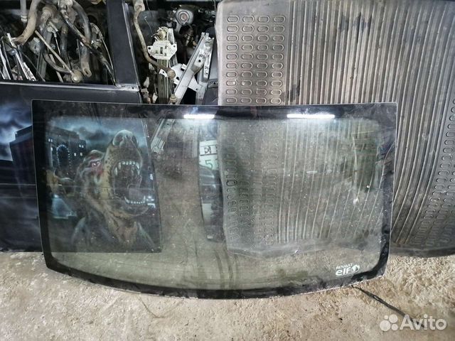 Стекло заднее Renault logan