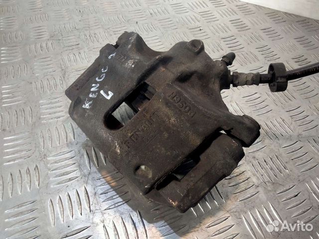 Суппорт передний левый Renault Kangoo