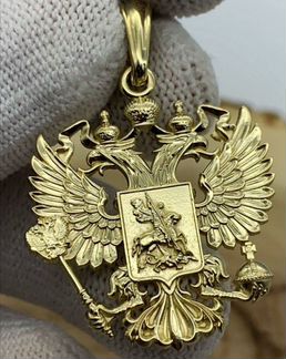 Герб России из золота